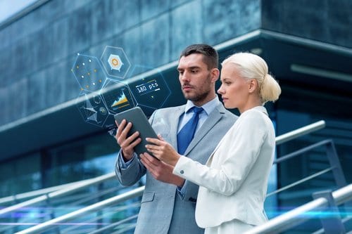 business people with tablet pc outdoors